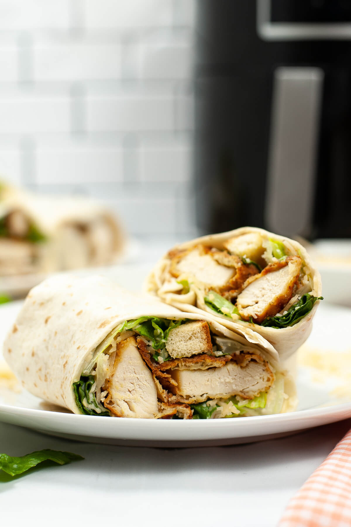 chicken caesar wraps on a plate