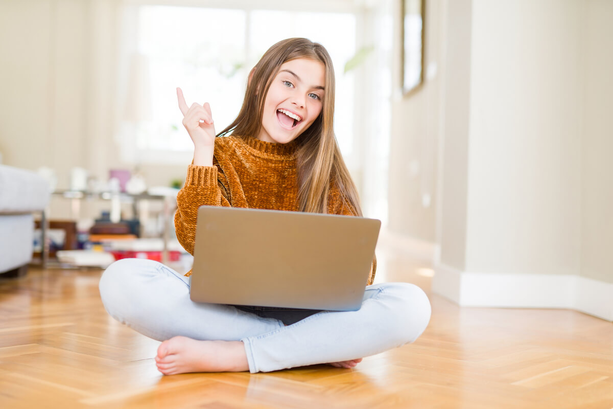 teen girl with laptop