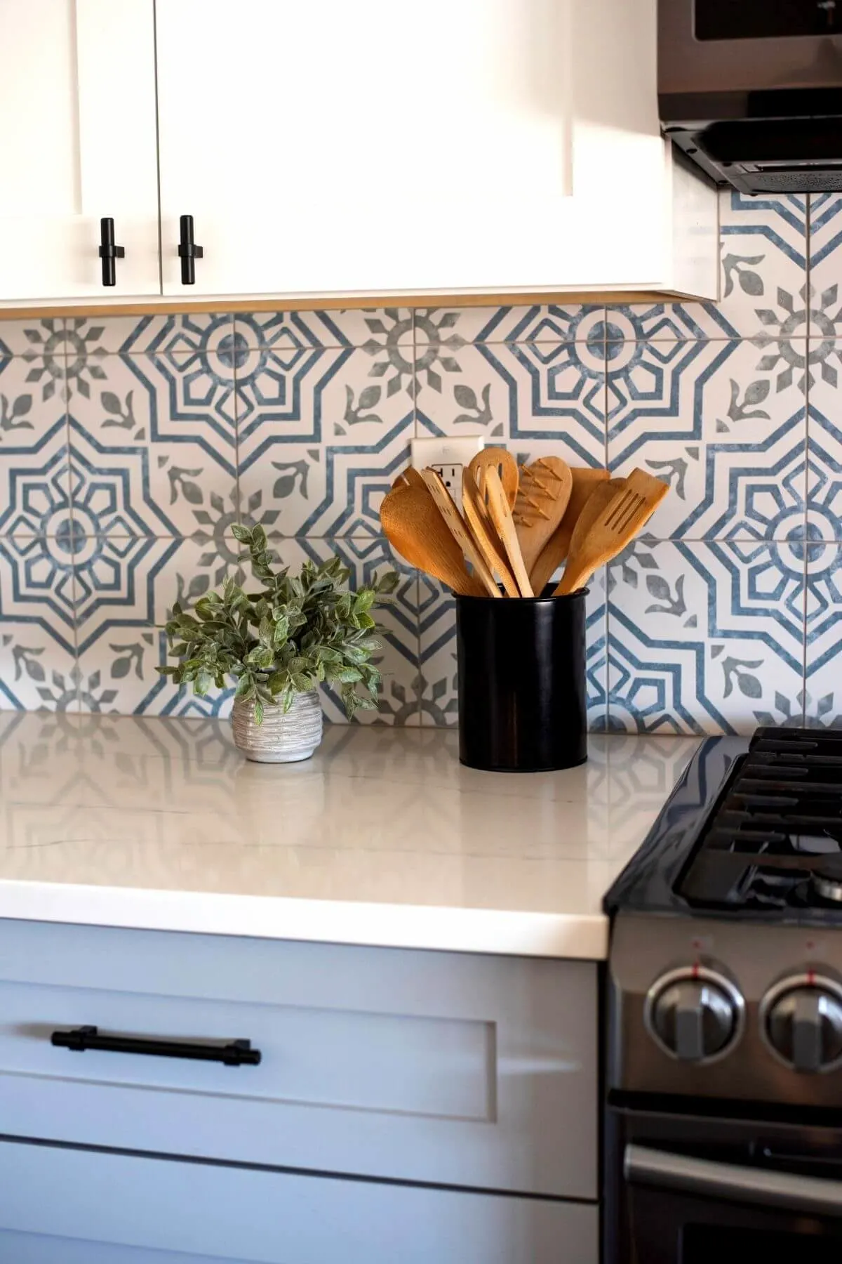 tidy kitchen counter with utensils