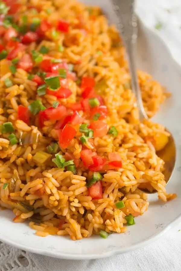 BBQ rice in a bowl with a spoon