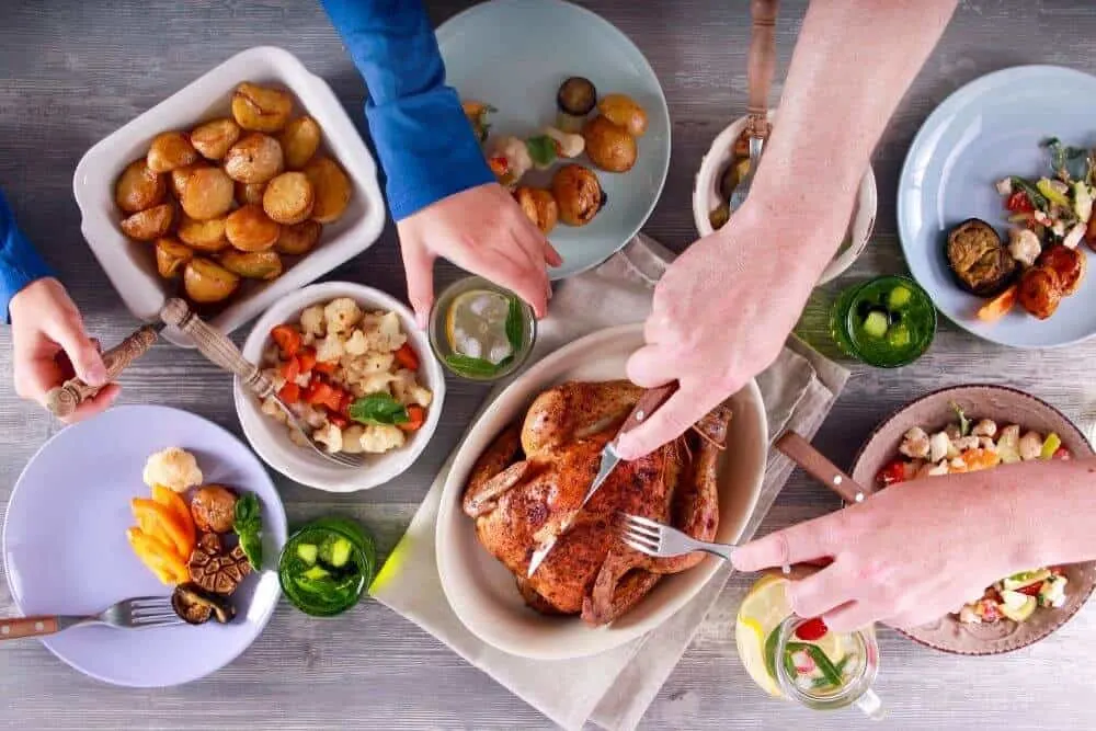 Family helping to prepare dinner