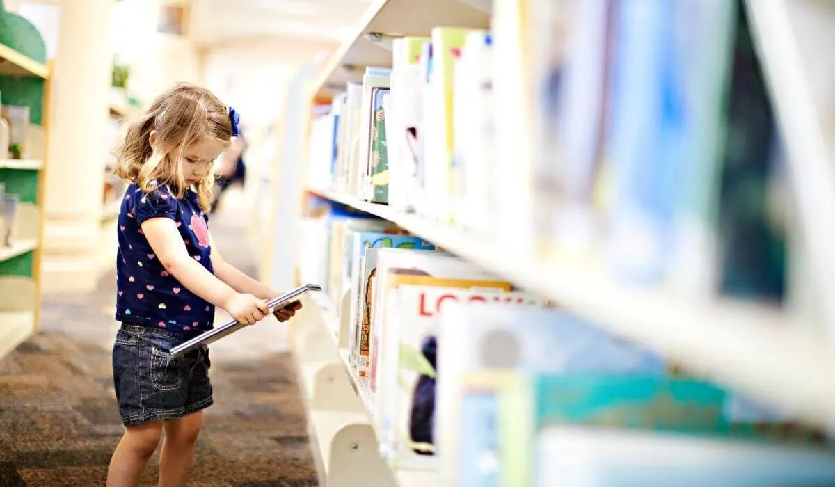 child at public library